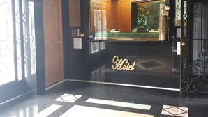 A hotel entrance with a sign reading "Villa Princess Hotel." - Villas Princess Hotel (Mexico City)