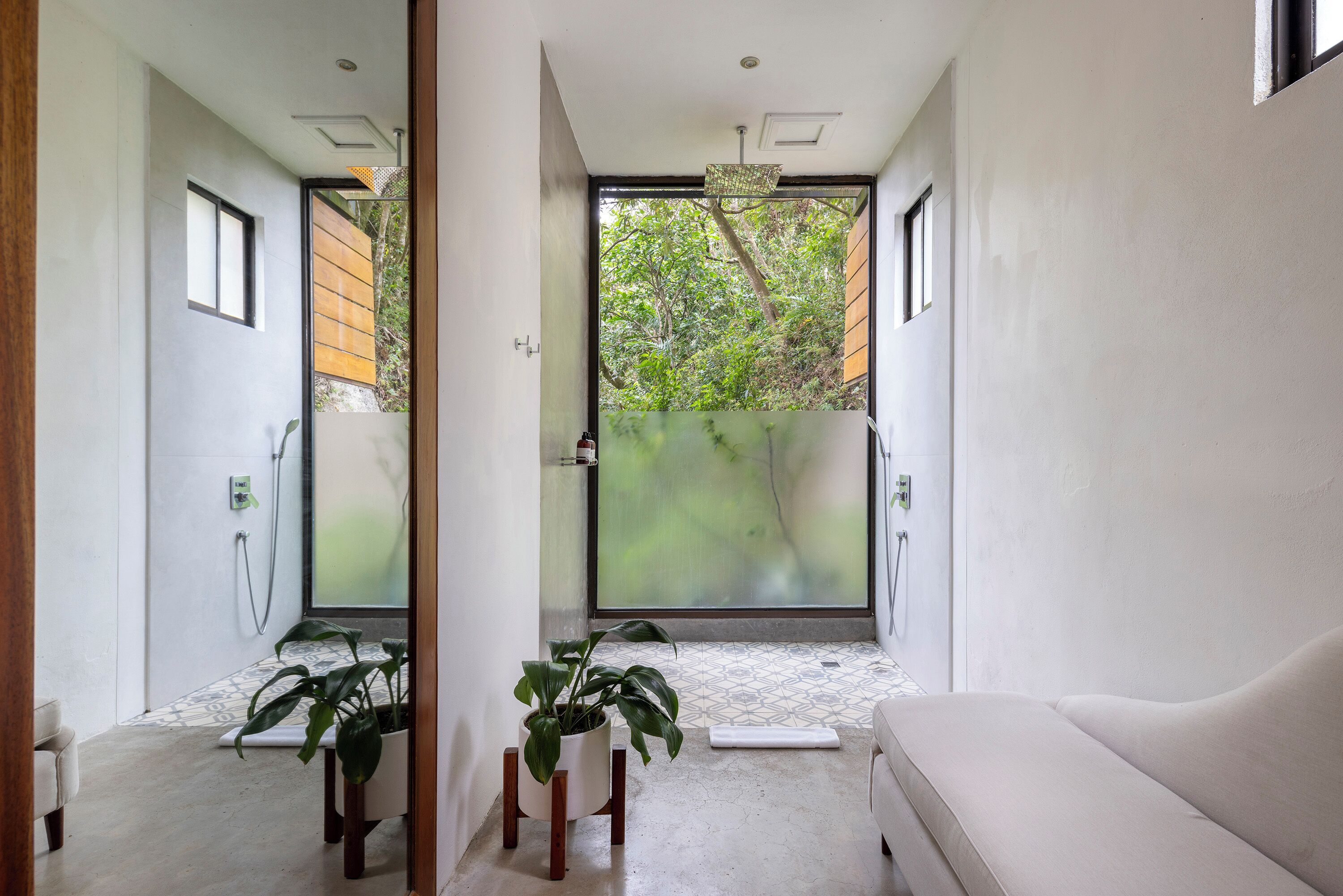 nicoya suite | bathroom | eco-friendly toiletries, hair dryer, bathrobes, slippers