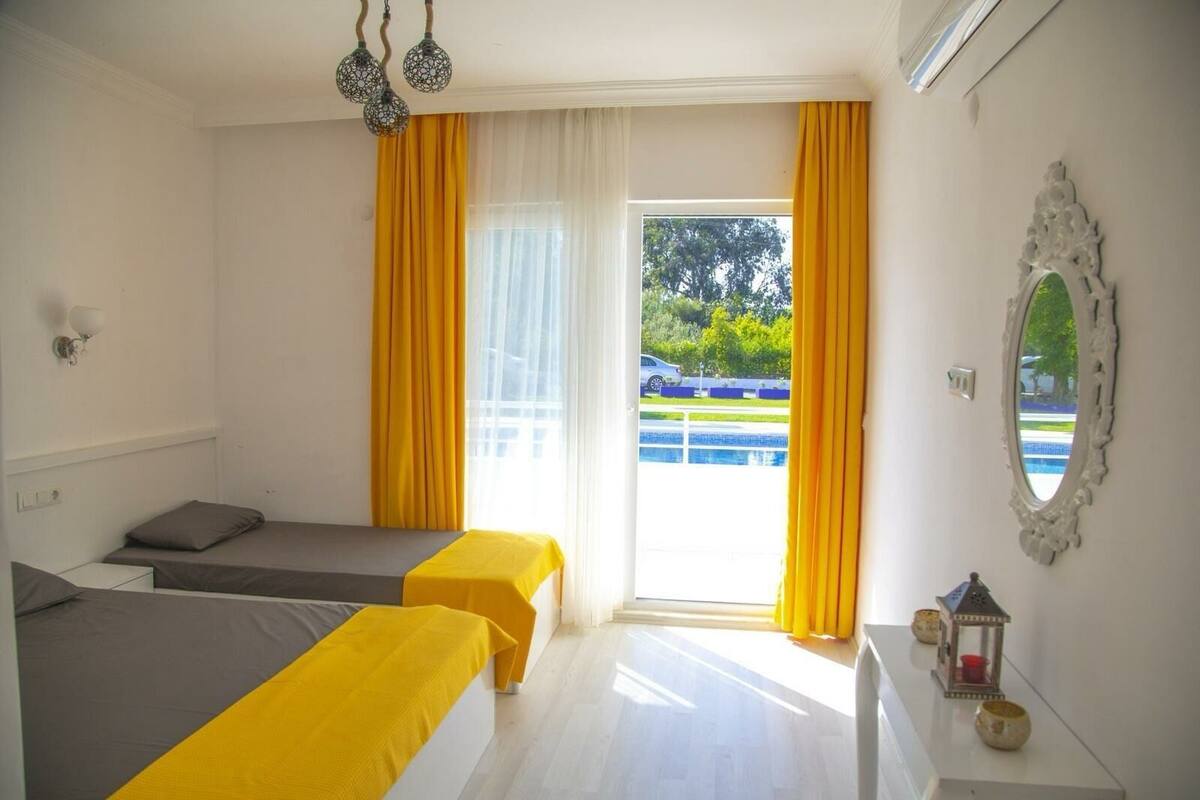 Premium bedding, memory foam beds, minibar (some free items), desk