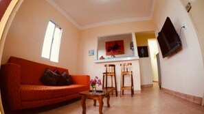 Apartment, 2 Bedrooms | Living area | Flat-screen TV