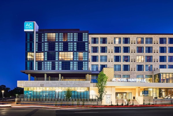 A hotel with a modern design, featuring a prominent AC logo on the facade. - AC Hotel Huntsville Downtown (Huntsville)