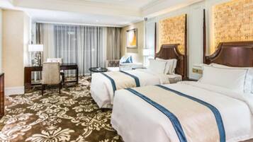 Premium bedding, down duvets, pillow-top beds, in-room safe