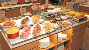 A buffet with various food items and dishes. - Urban Hotel Kyoto Gojo Premium (Kyoto)