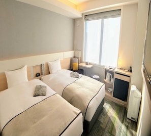 Skrivbord, mörkläggningsgardiner, gratis wi-fi och sängkläder