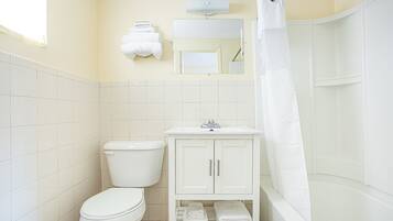 Combined shower/bathtub, soap, shampoo, toilet paper