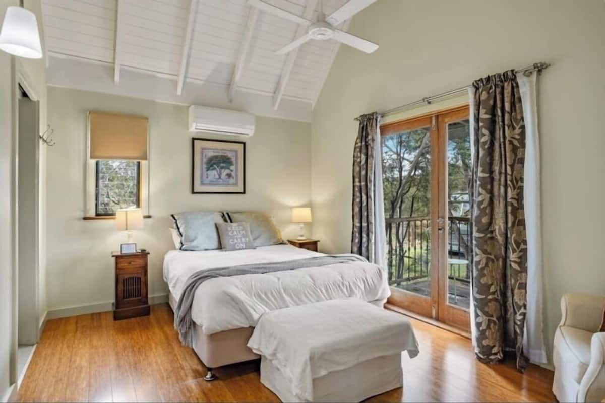Poinciana Room | Premium bedding, pillow-top beds, individually decorated, soundproofing
