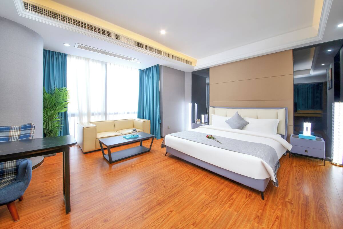 ดีลักซ์สตูดิโอ | เครื่องนอนระดับพรีเมียม, ผ้านวมขนเป็ด, เตียง  พร้อมฟูกเสริมที่นอน