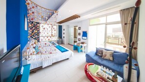 A modern hotel room with a bed, a sofa, a TV, and a window with curtains. - HI One One (Magong)