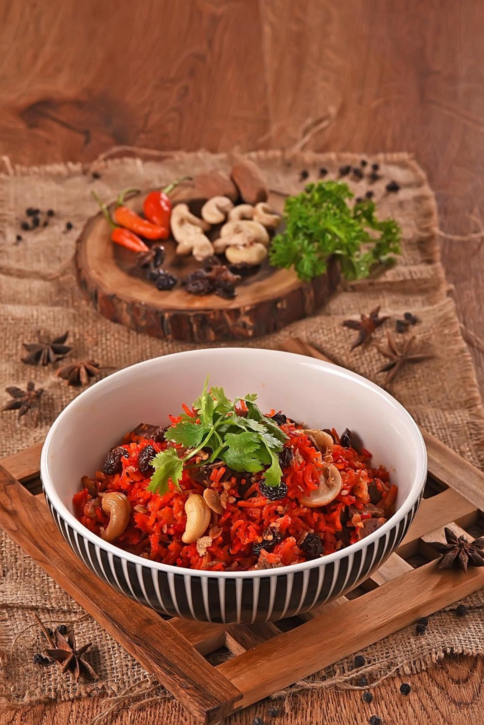 A bowl of food with a rustic wooden background.