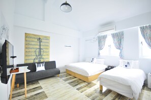Blackout curtains, soundproofing, free WiFi, bed sheets