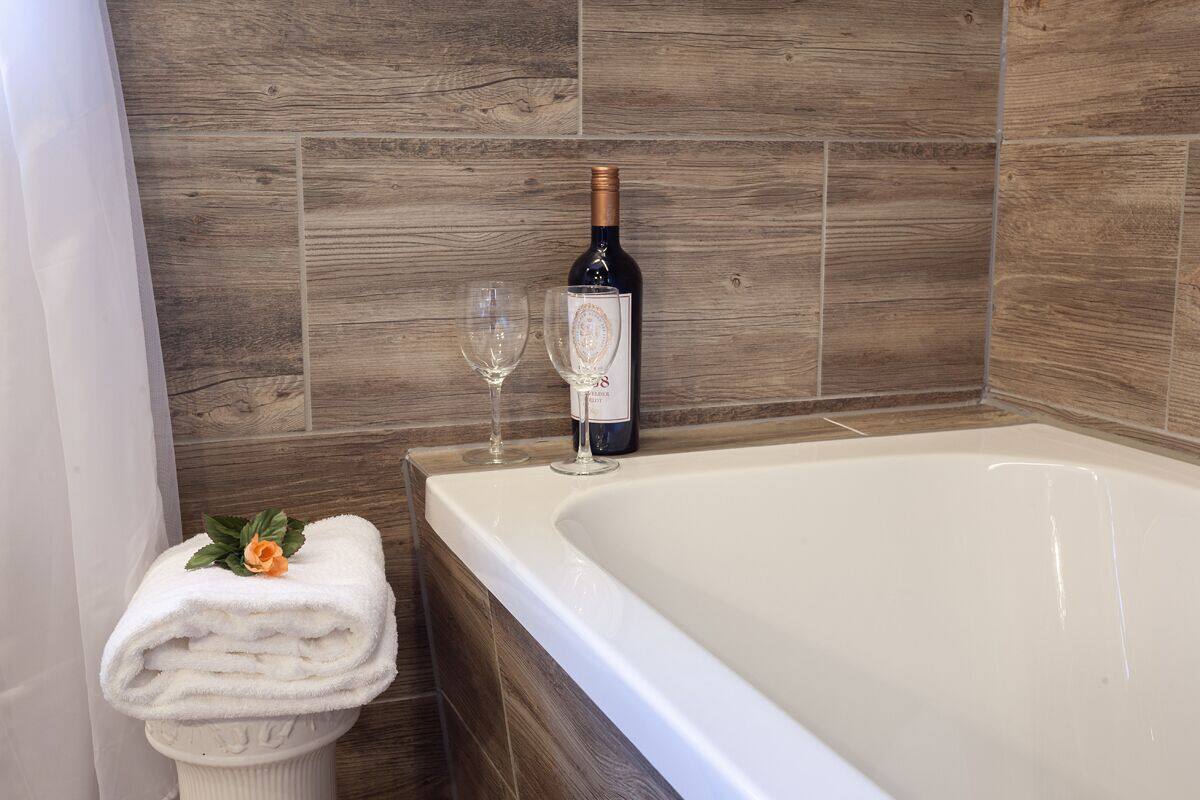 apartment, 1 bedroom, mountain view | bathroom | shower, designer toiletries, hair dryer, slippers