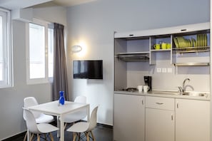 Studio, City View (A3) | Private kitchen | Fridge, stovetop, coffee/tea maker, electric kettle