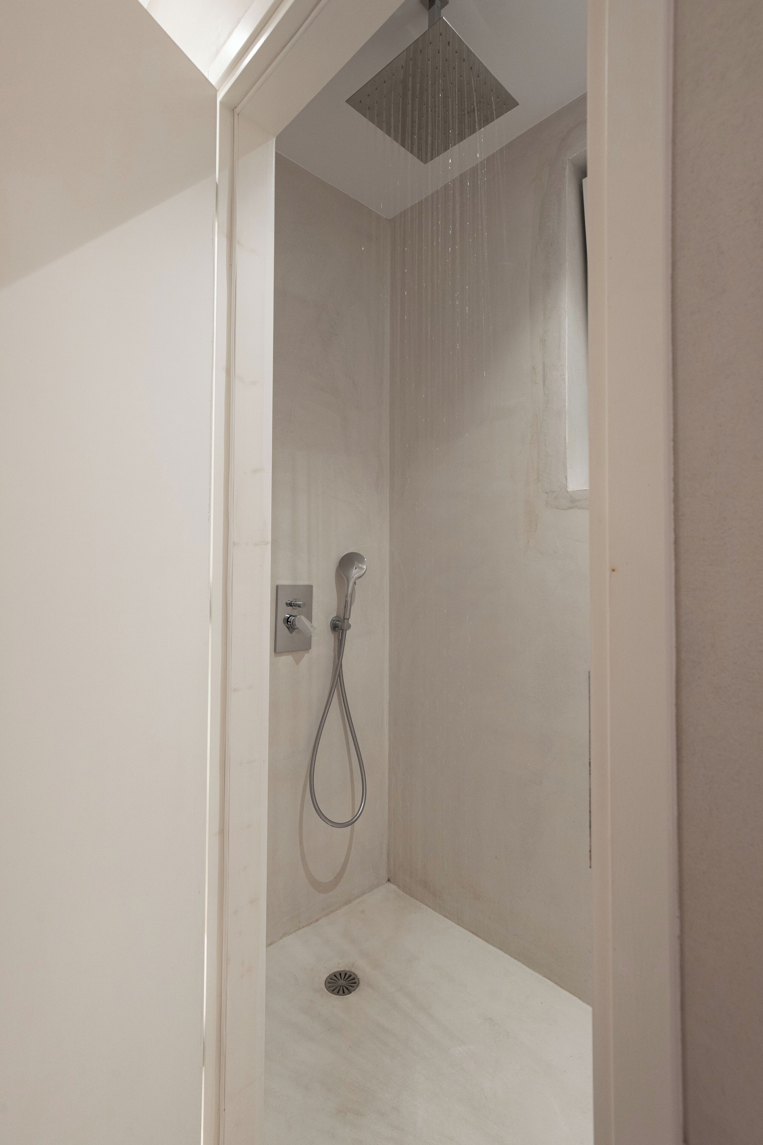Shower, rainfall showerhead, designer toiletries, hair dryer