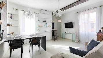 Apartment, 1 Bedroom | Living room | 32-inch flat-screen TV with digital channels, TV