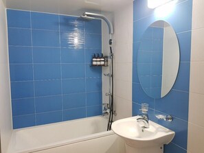 Deluxe Room, Multiple Beds | Bathroom | Bathtub, free toiletries, hair dryer, bathrobes