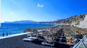 Beach nearby, black sand, free beach cabanas, sun loungers