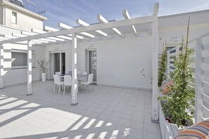 Apartament Deluxe, diversos llits, vistes a la platja (New York) | Terrassa o pati