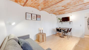 Basic Apartment, 1 Bedroom (4 persons, A) | Living area | Flat-screen TV