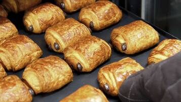 A tray of freshly baked croissants.