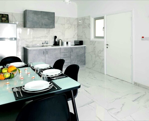 Deluxe Suite, 2 Bedrooms | In-room dining