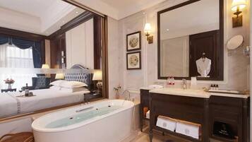 Executive Double Room | Bathroom | Hair dryer, slippers, towels, soap