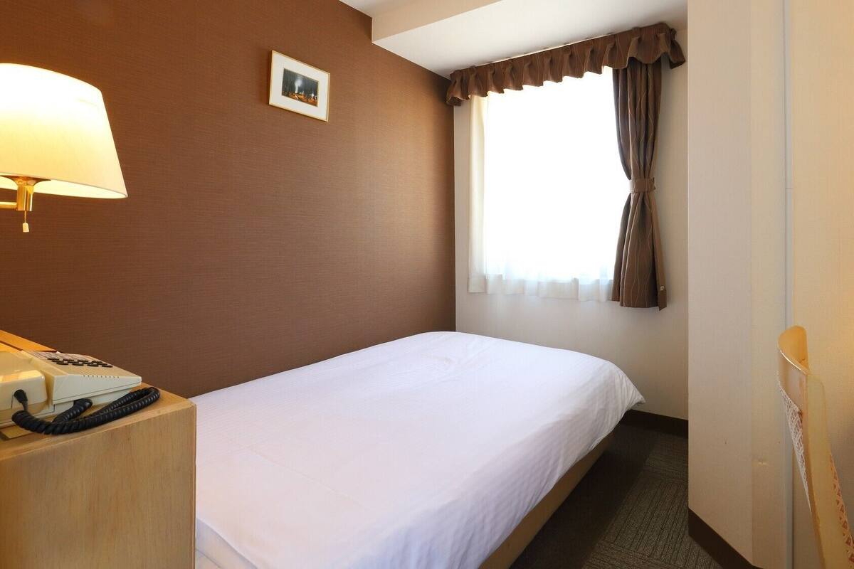 Desk, blackout curtains, iron/ironing board (on request), free WiFi