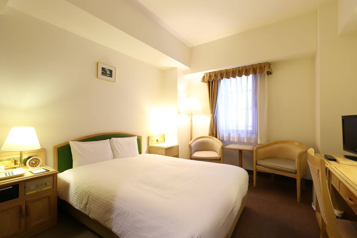 Desk, blackout curtains, iron/ironing board (on request), free WiFi