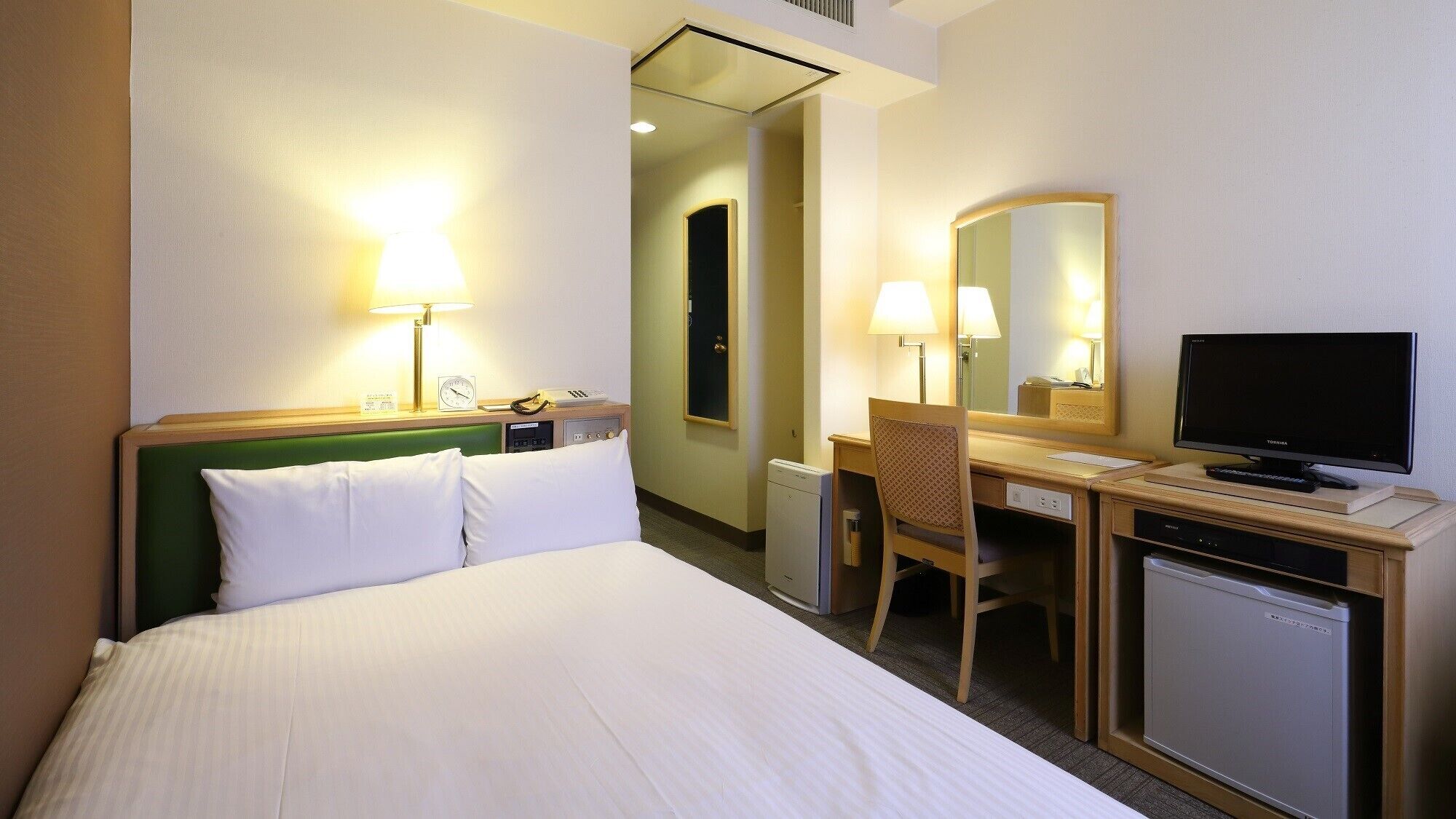Desk, blackout curtains, iron/ironing board (on request), free WiFi