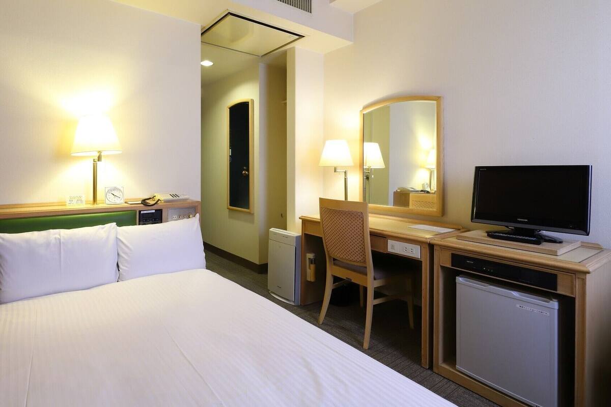 Desk, blackout curtains, iron/ironing board (on request), free WiFi