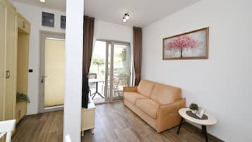 Apartment, Terrace | Living area | Flat-screen TV