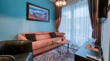 Comfort-Apartment | Wohnzimmer | Flachbildfernseher