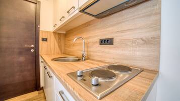 Studio, Sea View | Private kitchen | Fridge, stovetop, electric kettle, cookware/dishes/utensils