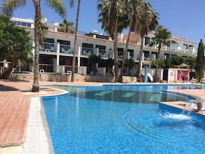 2 outdoor pools, open 9:00 AM to 7:30 PM, pool umbrellas, pool loungers