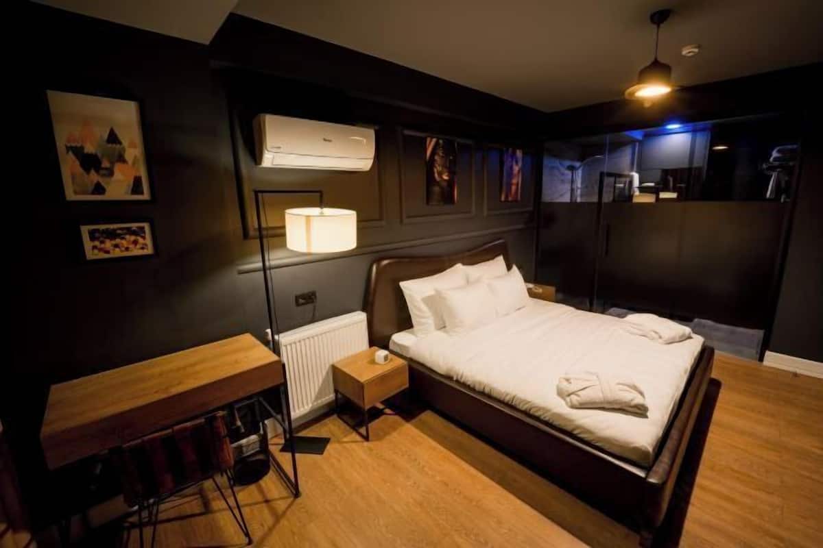 Premium bedding, memory-foam beds, minibar, laptop workspace