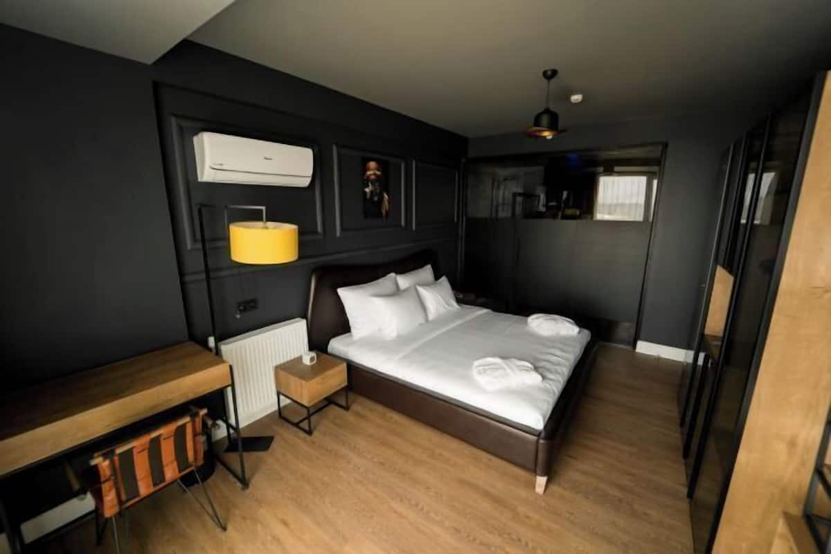 Premium bedding, memory foam beds, minibar, laptop workspace