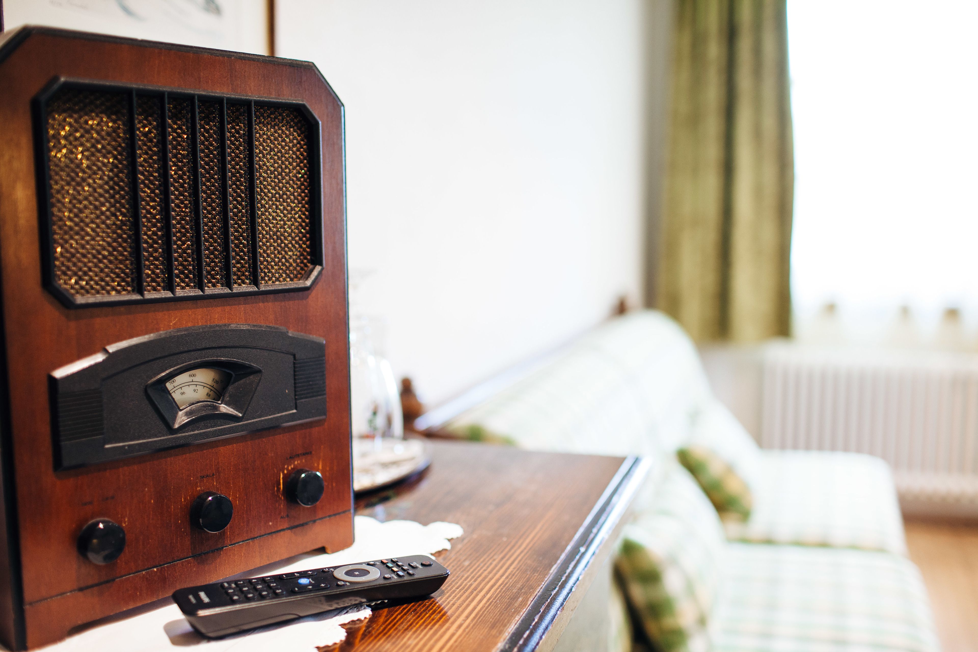 double room with partial balcony | living room | flat-screen tv