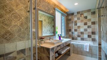 Deluxe Quadruple Room | Bathroom | Shower, hair dryer, slippers, towels