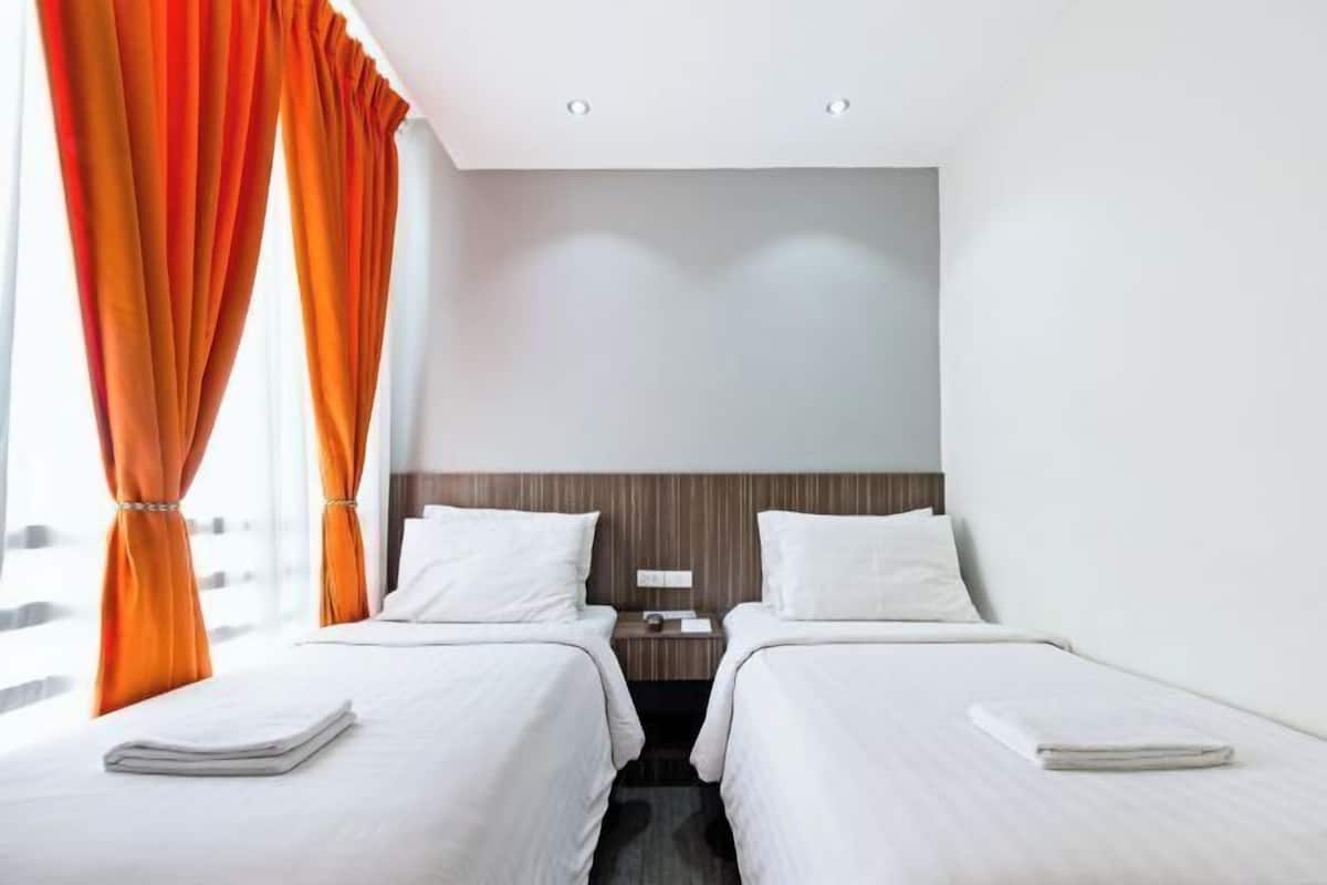 Desk, blackout drapes, WiFi (free), bed sheets