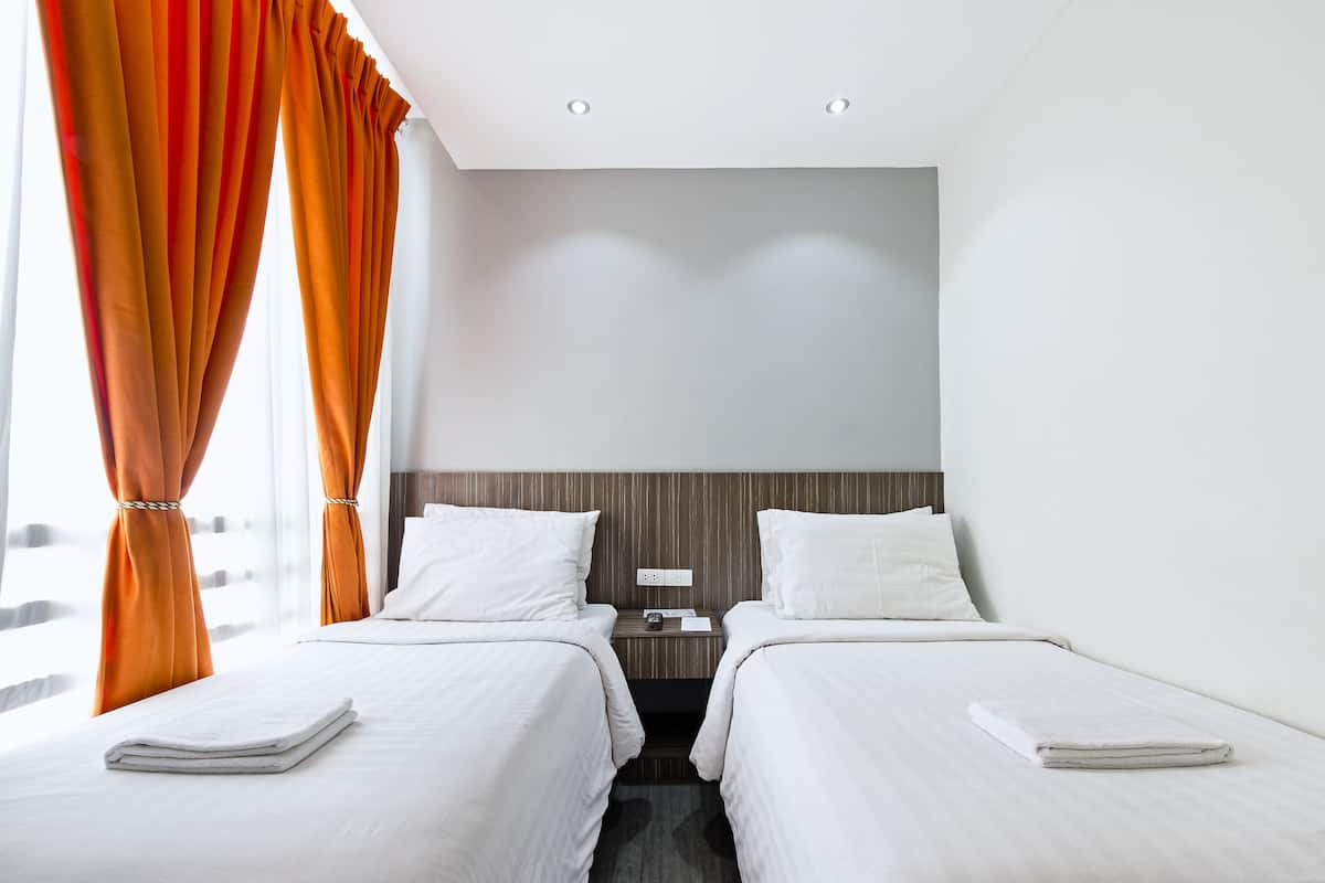 Desk, blackout drapes, WiFi (free), bed sheets