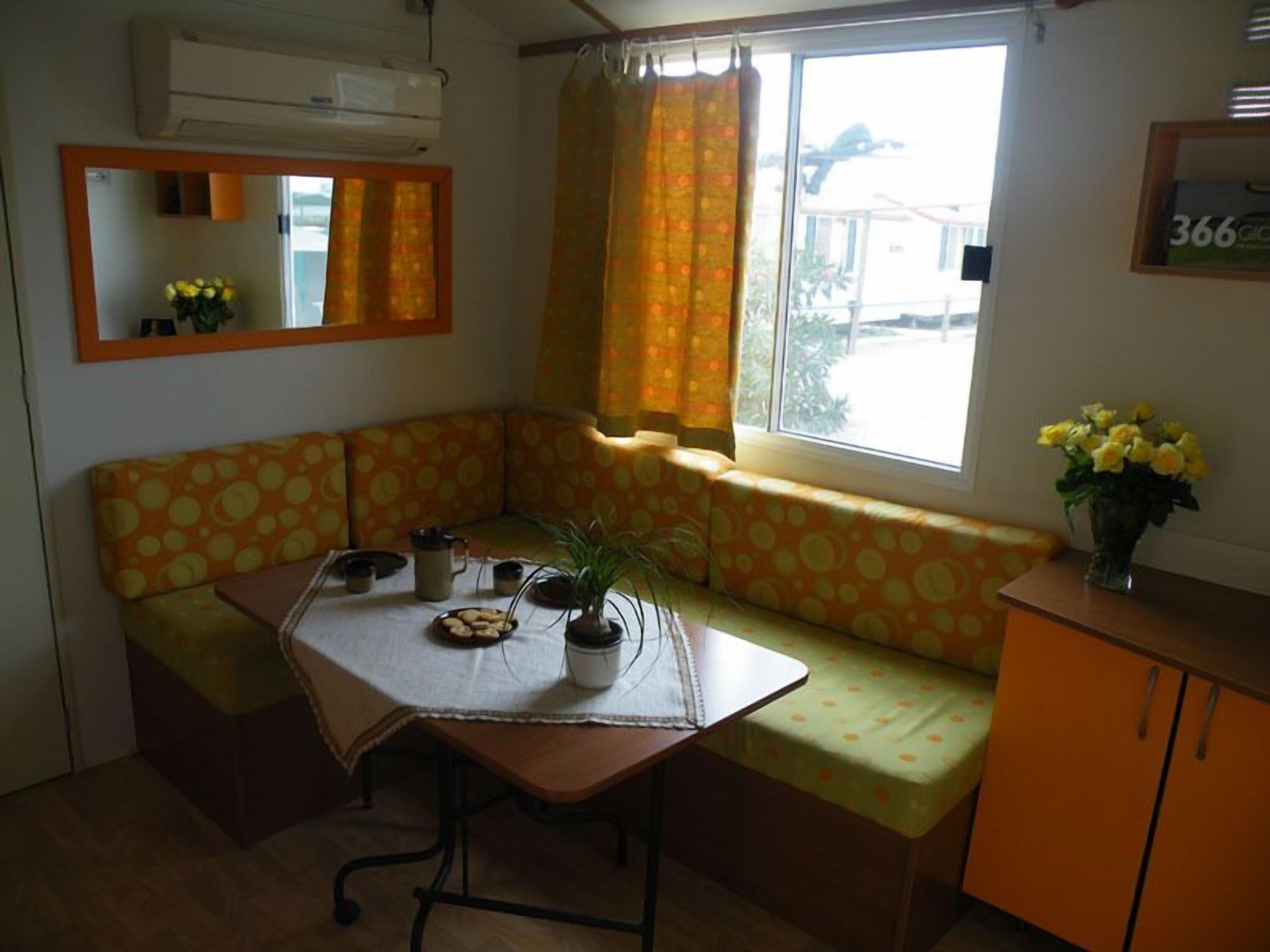 Mobile Home, Multiple Beds (CAPRAIA) | Living area | Flat-screen TV