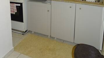 Apartment, Sea View (Sea Dream) | Private kitchen | Full-sized fridge, stovetop, coffee/tea maker, electric kettle