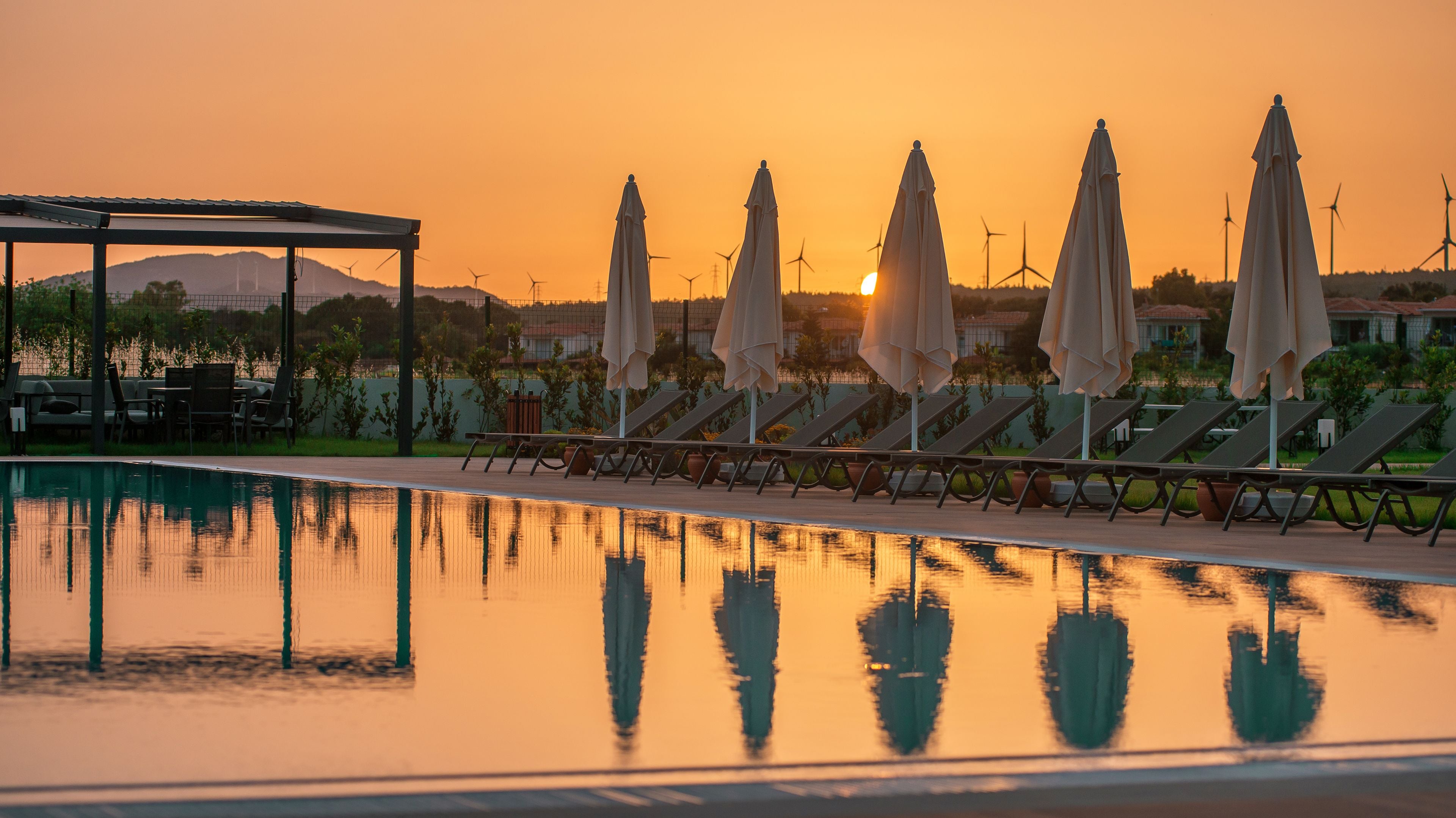 Indoor pool, seasonal outdoor pool, pool umbrellas, sun loungers