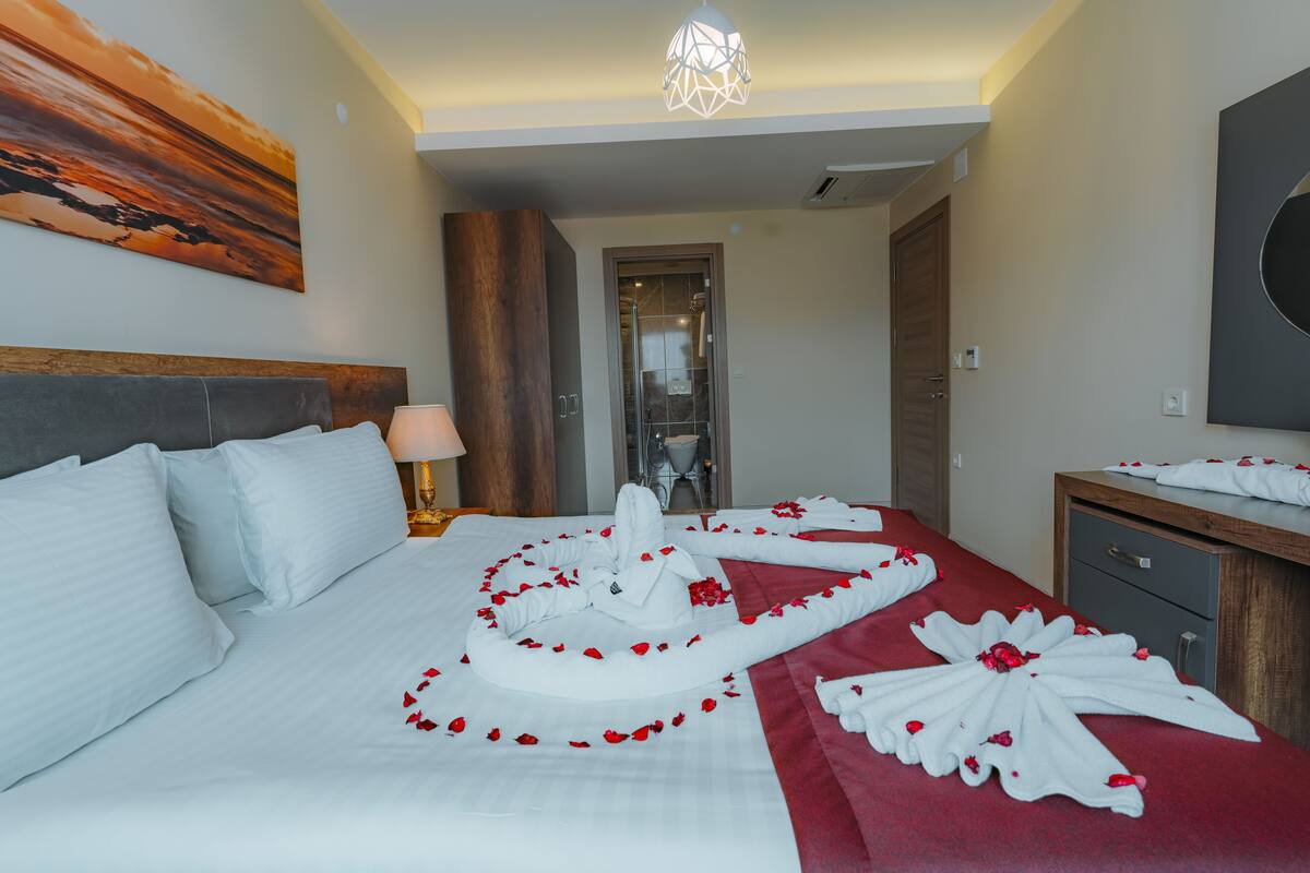 Deluxe Apartment, Sea View | Frette Italian sheets, premium bedding, down comforters