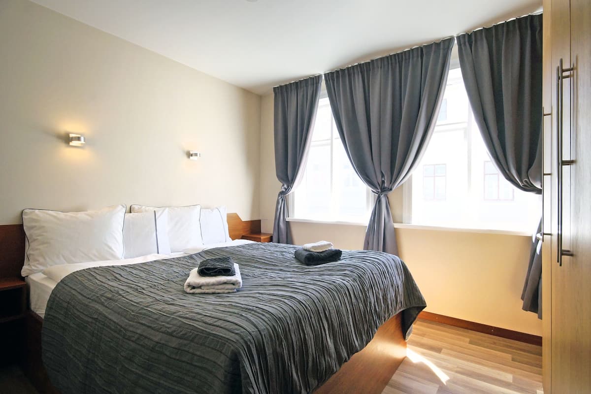 Apartment, 2 Bedrooms | Blackout curtains, iron/ironing board, free cots/infant beds, free WiFi