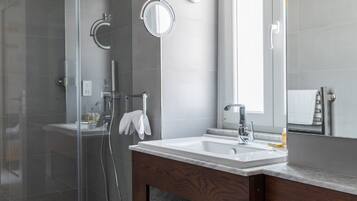 Deluxe Double Room | Bathroom | Shower, rainfall showerhead, hair dryer, bathrobes