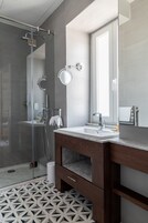Deluxe Double Room | Bathroom | Shower, rainfall showerhead, hair dryer, bathrobes