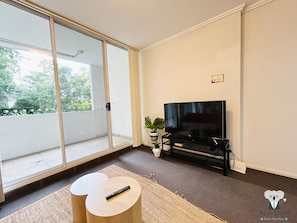 Apartment (2 Bedrooms) | Living area | TV