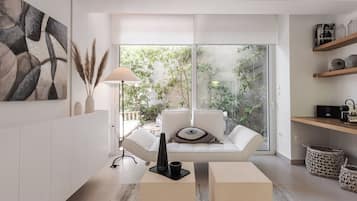 Utopia 1 Bedroom Apartment | Living area | 40-inch flat-screen TV with digital channels, TV