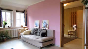 Familienapartment (Weidenschau) | Wohnzimmer | Flachbildfernseher