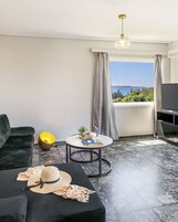 Apartment, 2 Bedrooms, Sea View | Living area | 32-inch flat-screen TV with digital channels, TV